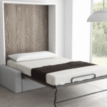 cama abatible de matrimonio con sofá y arcón
