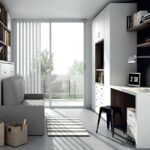 Cama abatible con sofá y armario librería.