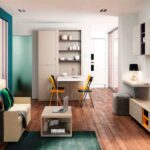 Cama abatible con sofá delante