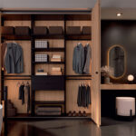 armario abierto dormitorio matrimonio con aseo lateral