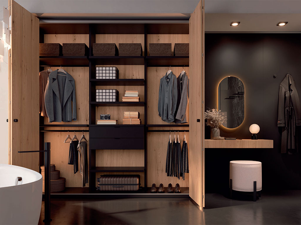 armario abierto dormitorio matrimonio con aseo lateral